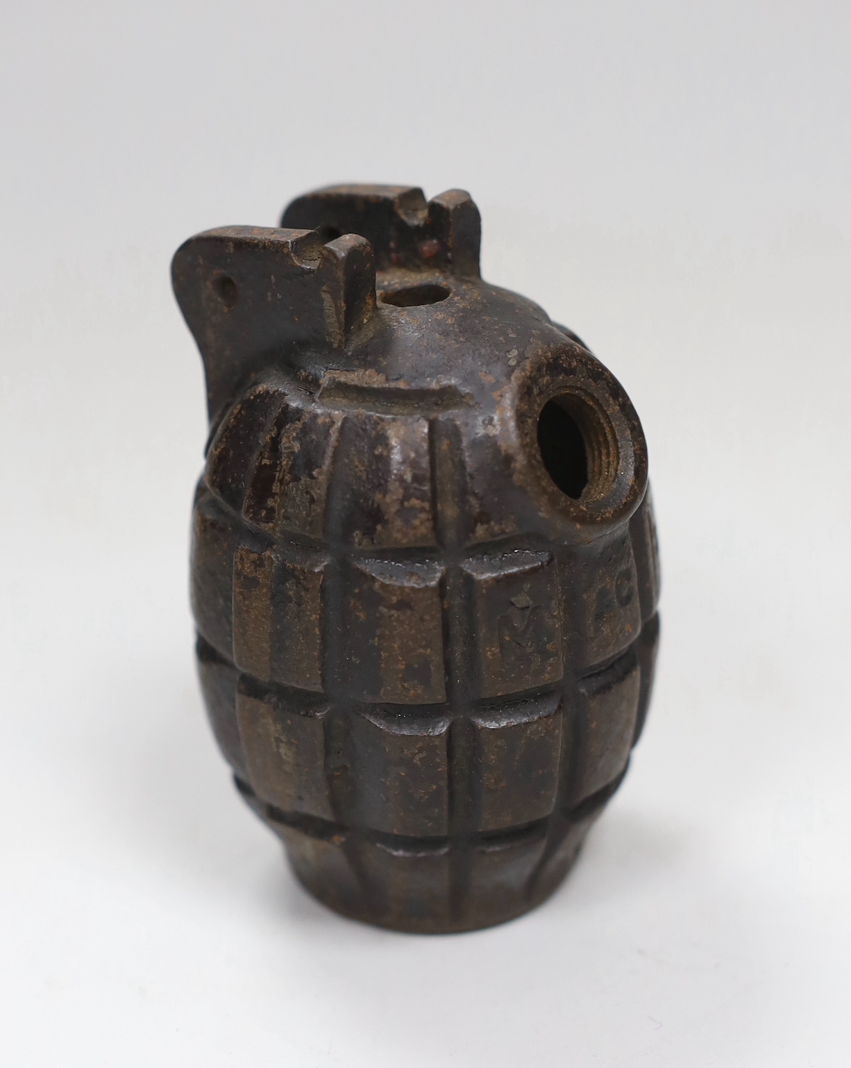 A World War II army hand grenade shell, 9cm high